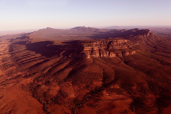 6-Day Eyre Peninsula & Flinders Ranges Adventure Tour - Wilpena Pound sunrise and ranger John from Ngai Nhina Yuras