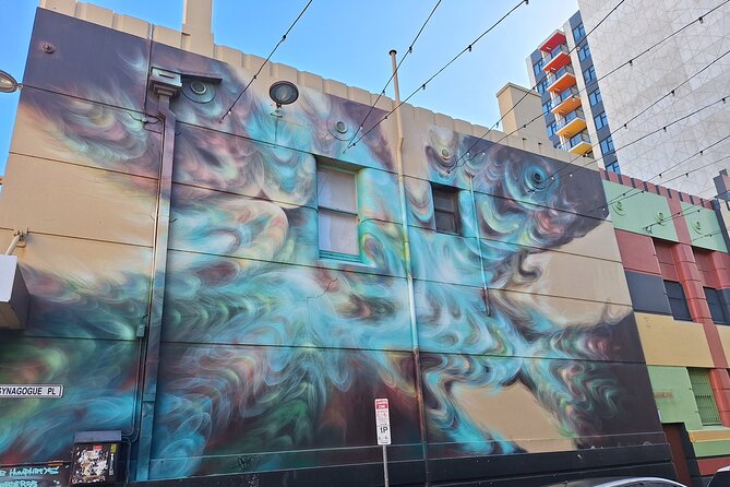 Hidden Adelaide: Laneways and Street Art Tour - Stop 3: Rundle Mall and the Shift from Main Street to Details